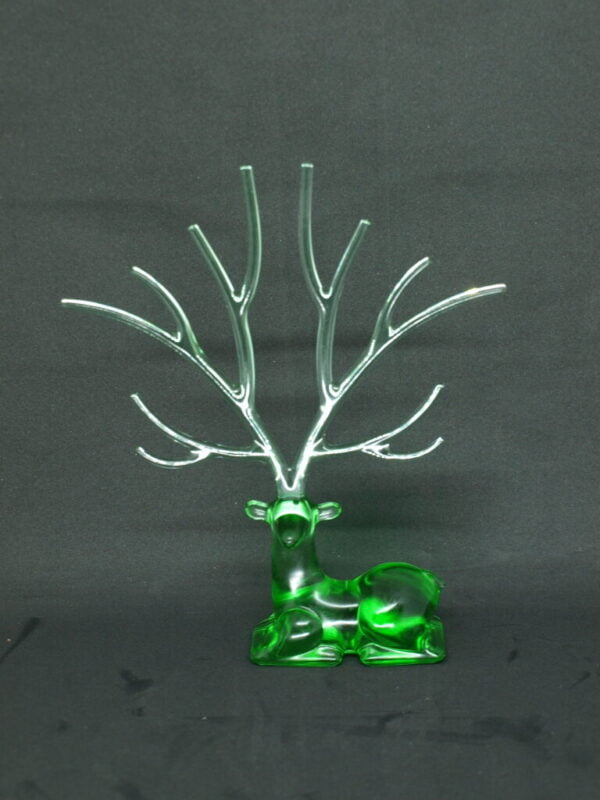 Green deer with medium antlers